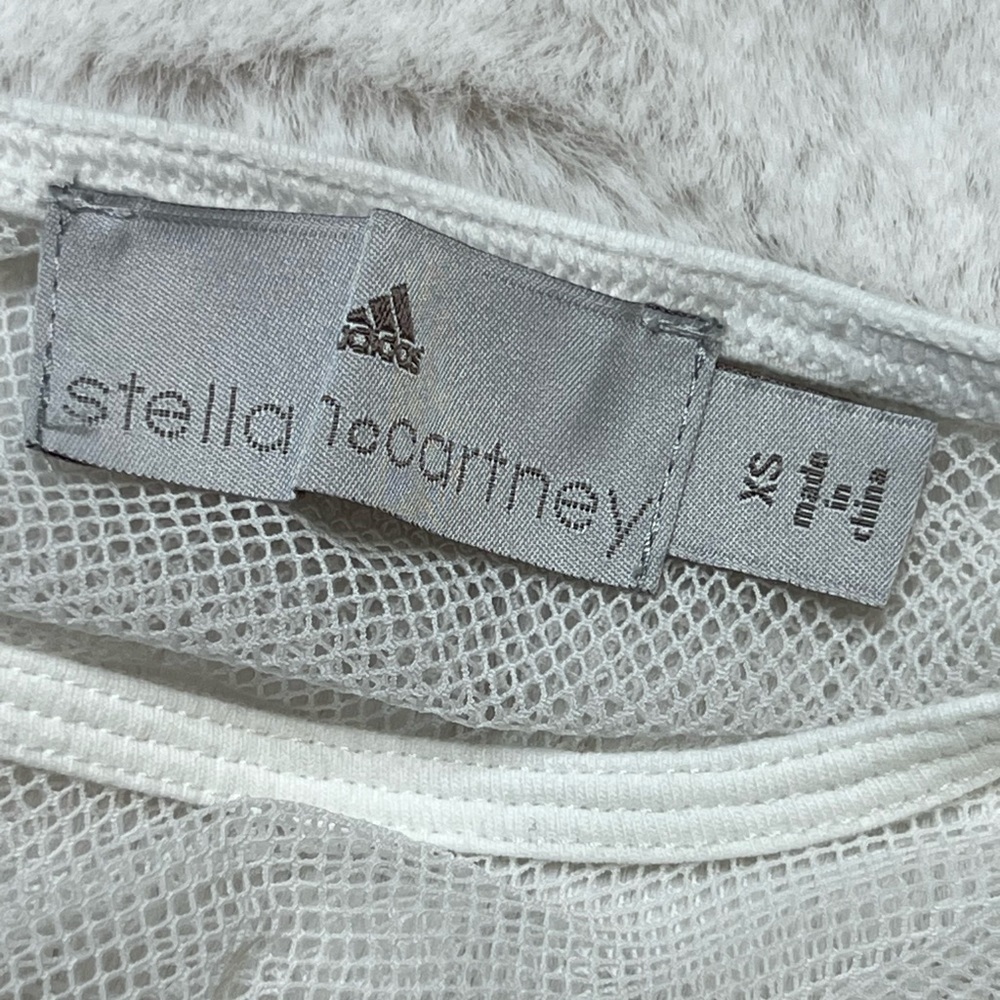 White adidas work out active shirt with mesh on the top and bottom. - Picture 8 of 8